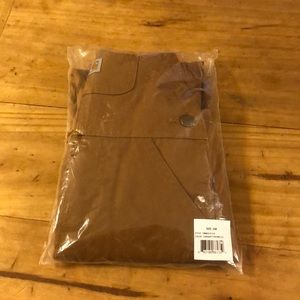 New Carhartt canvas bibs 24 months color is Duck